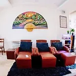 Panoramic View Tower: Garden Oasis Apartment