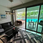 Beachfront Luxe With Pool Access And Terrace
