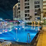อพาร์ทเม้น 5分钟到海边 市中心 全新房 全新泳池 自助锁 网络电视 阳台 私人洗衣机 可两房联订 Pattaya