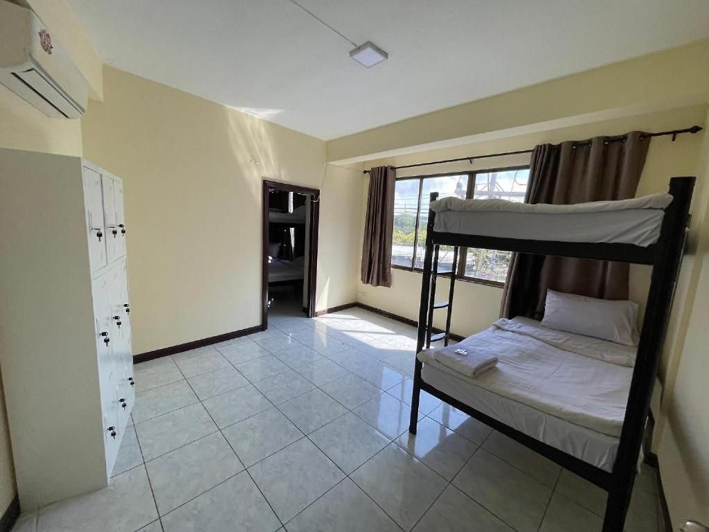 โรงแรม Maland House - Soi 14 Saisong Road