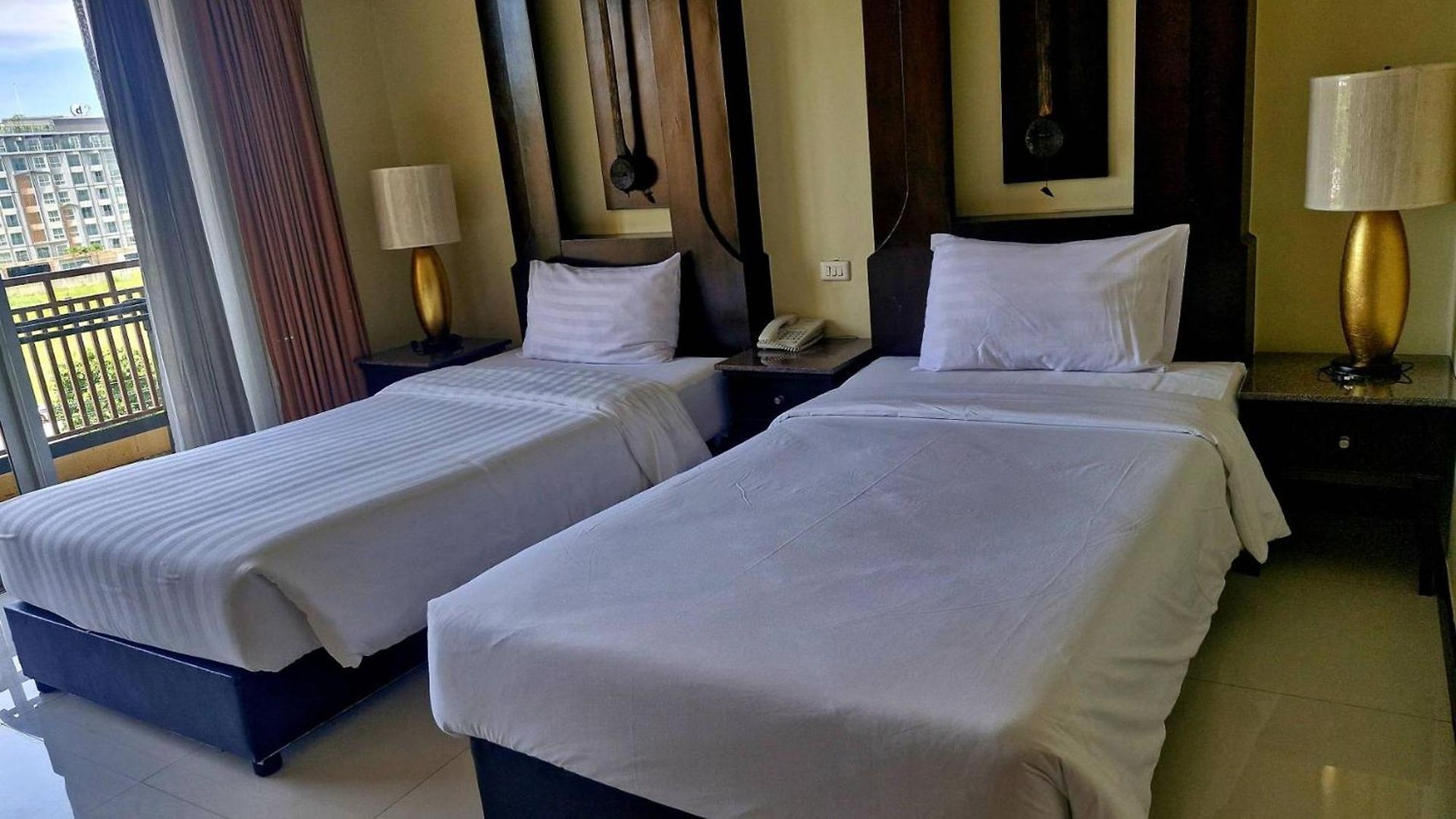 โรงแรม Sunday Chateau En - Pattaya