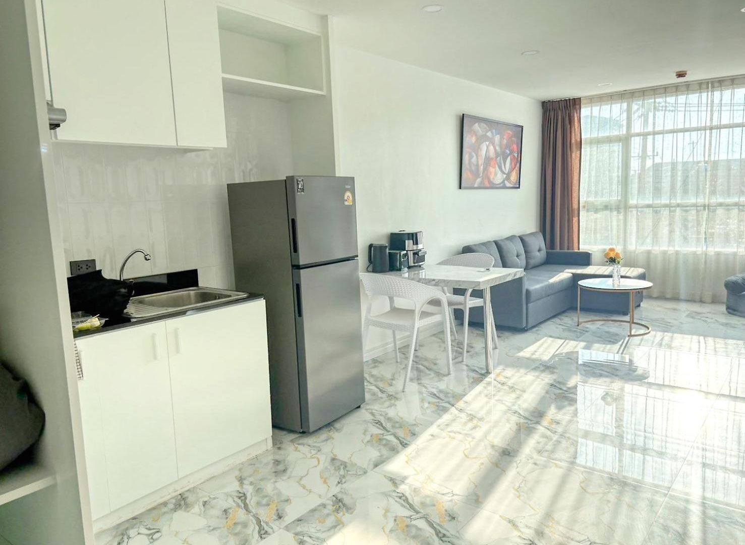The Ocean Pearl - Steps Waterpark & Market Apartment Pattaya