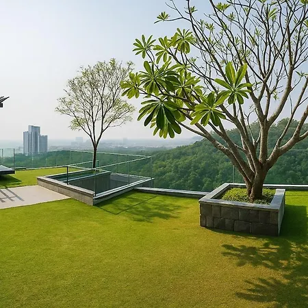 Luxury Balcony View With Open Sky And Greenery