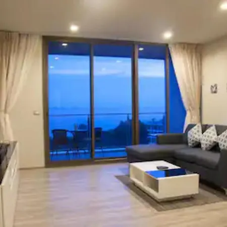 Beach Overlooking The Sea *