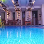 Tycoon Holiday Hotel โรงแรม